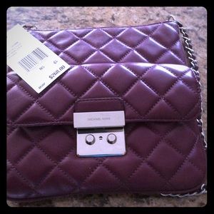 Michael Kors “Sloan” quilted swing purse in plum